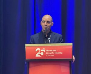 Dr. Clavell giving speech.